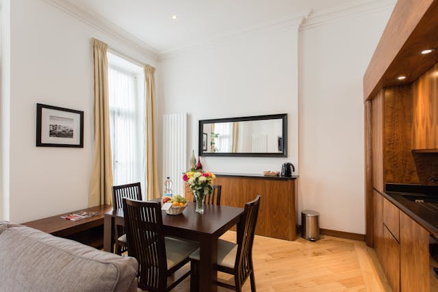 living room with wooden furniture and finishings